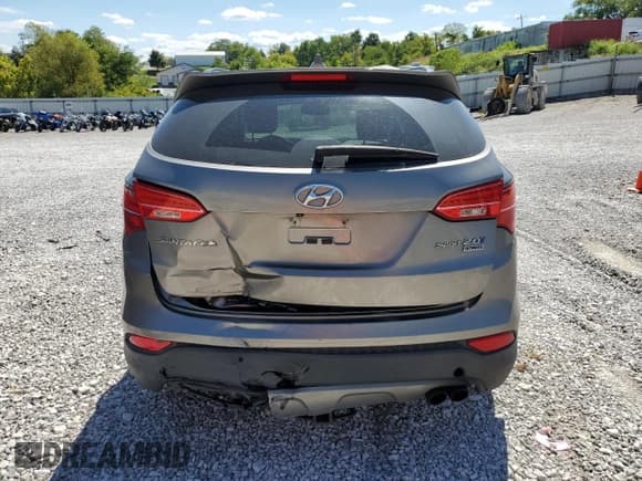 ✅ 2015 Hyundai Santa Fe • VIN: 5XYZW4LAXFG239754 • Lot: 71499665. Listed on Copart with 75,339 mi. Free auction sales archive from the USA and detailed vehicle history report at DreamBid. Image 6.