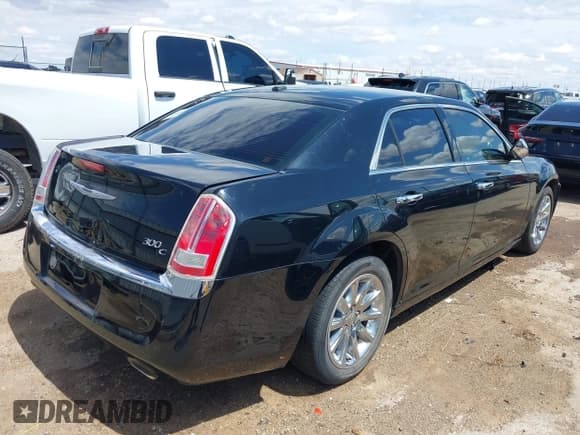 ✅ 2012 Chrysler 300 C • VIN: 2C3CCAET8CH309247 • Lot: 42460648. Listed on IAAI with 121,168 mi. Free auction sales archive from the USA and detailed vehicle history report at DreamBid. Image 4.
