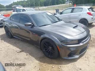 2020 Dodge Charger Scat Pack with VIN 2C3CDXGJ5LH161182, listed as a IAAI auction lot 42486810 with 70,065 mi miles and . Bid and sale history available at DreamBid. Image 1.