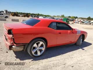 2013 Dodge Challenger R/T Plus z VIN 2C3CDYBTXDH728759, wystawiony jako Copart lot #73463964 z przebiegiem 138 738 mil mil oraz Szkoda całkowita • Salvage title. Historia ofert i sprzedaży dostępna na DreamBid. Obrazek 3.