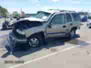 2001 Chevrolet Tahoe LT z VIN 1GNEK13T81R122136, wystawiony jako IAAI lot #42272857 z przebiegiem 216 060 mil mil oraz . Historia ofert i sprzedaży dostępna na DreamBid. Obrazek 2.