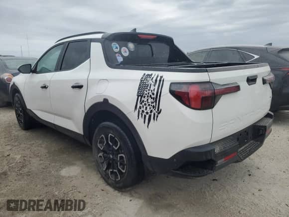 2023 Hyundai Santa Cruz SEL с VIN 5NTJCDAE7PH065939, выставлен на аукционе Copart как лот 75460454 с пробегом 28 921 миль миль и На запчасти • Non repairable. История ставок и продаж доступна на DreamBid. Изображение 2.