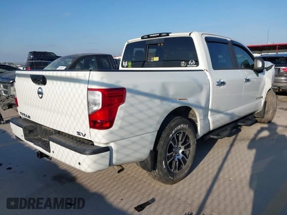 ✅ 2021 Nissan Titan SV • VIN: 1N6AA1EF8MN506539 • Lot: 43720616. Listed on IAAI with 21,204 mi. Free auction sales archive from the USA and detailed vehicle history report at DreamBid. Image 4.