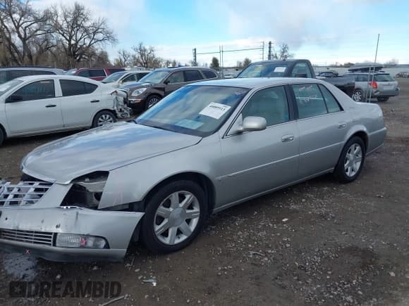 ✅ 2006 Cadillac DTS 1SC • VIN: 1G6KD57Y36U149979 • Lot: 41600417. Listed on IAAI with 106,058 mi. Free auction sales archive from the USA and detailed vehicle history report at DreamBid. Image 2.