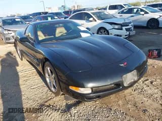 ✅ 2004 Chevrolet Corvette • VIN: 1G1YY22G645120159 • Lot: 43752732. Listed on IAAI with 128,869 mi. Free auction sales archive from the USA and detailed vehicle history report at DreamBid. Image 1.