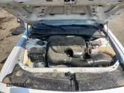 ✅ 2014 Dodge Challenger SXT • VIN: 2C3CDYAG0EH149589 • Lot: 80923345. Wystawiony na Copart z przebiegiem 97 282 mil. Bezpłatny archiwum sprzedaży aukcyjnych z USA i szczegółowy raport historii pojazdu na DreamBid. Zdjęcie 11.