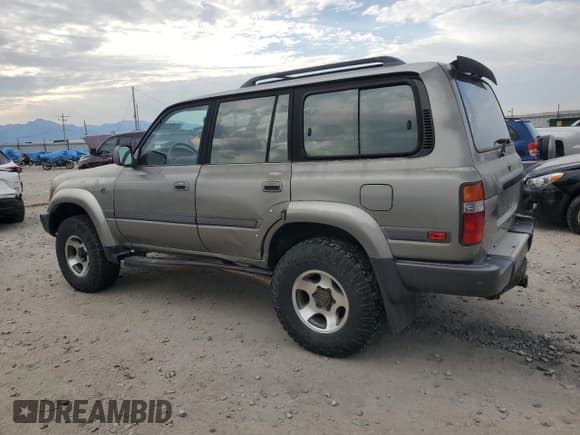 ✅ 1997 Toyota Land Cruiser • VIN: JT3HJ85J6V0170911 • Лот: 71258785. Опубликован ранее на Copart с пробегом 206 192 миль. Бесплатный доступ к архиву аукционных продаж из США и подробный отчёт об истории автомобиля на DreamBid. Изображение 2.