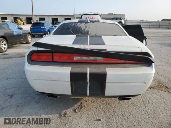 2013 Dodge Challenger SXT z VIN 2C3CDYAG8DH627871, wystawiony jako Copart lot #68657084 z przebiegiem Nie podano mil oraz Szkoda całkowita • Salvage title. Historia ofert i sprzedaży dostępna na DreamBid. Obrazek 11.