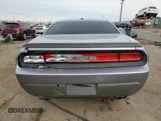 ✅ 2013 Dodge Challenger SXT • VIN: 2C3CDYAG8DH676424 • Lot: 83821064. Wystawiony na Copart z przebiegiem 86 842 mil. Bezpłatny archiwum sprzedaży aukcyjnych z USA i szczegółowy raport historii pojazdu na DreamBid. Zdjęcie 6.