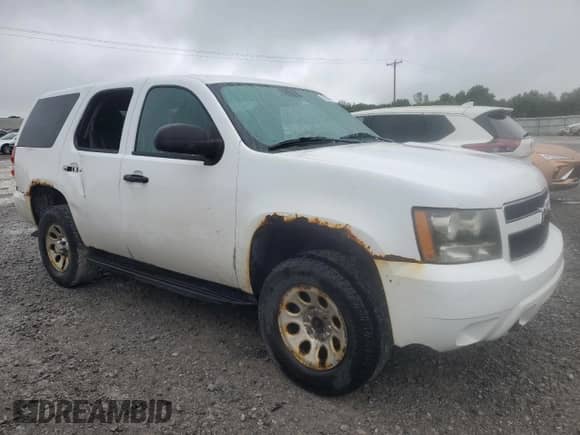 2011 Chevrolet Tahoe Commercial with VIN 1GNSK2E09BR158558, listed as a Copart auction lot 77090724 with 168,228 mi miles and Clean title. Bid and sale history available at DreamBid. Image 4.