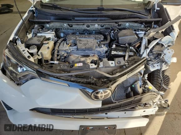 ✅ 2018 Toyota RAV4 LE • VIN: JTMBFREV7JJ217363 • Lot: 91433015. Listed on Copart with 66,579 mi. Free auction sales archive from the USA and detailed vehicle history report at DreamBid. Image 12.