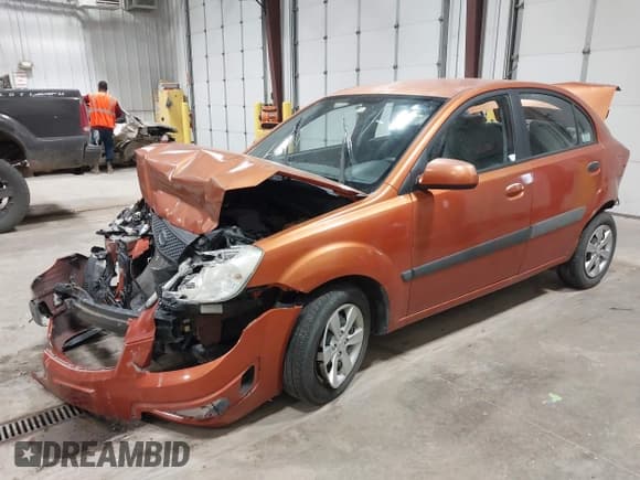 ✅ 2009 Kia Rio LX • VIN: KNADE223X96447092 • Lot: 43485187. Wystawiony na IAAI z przebiegiem 160 630 mil. Bezpłatny archiwum sprzedaży aukcyjnych z USA i szczegółowy raport historii pojazdu na DreamBid. Zdjęcie 18.