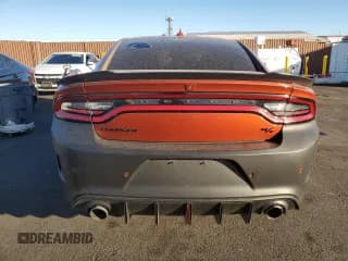 ✅ 2020 Dodge Charger R/T • VIN: 2C3CDXCTXLH255372 • Lot: 90879045. Wystawiony na Copart z przebiegiem 110 772 mil. Bezpłatny archiwum sprzedaży aukcyjnych z USA i szczegółowy raport historii pojazdu na DreamBid. Zdjęcie 6.