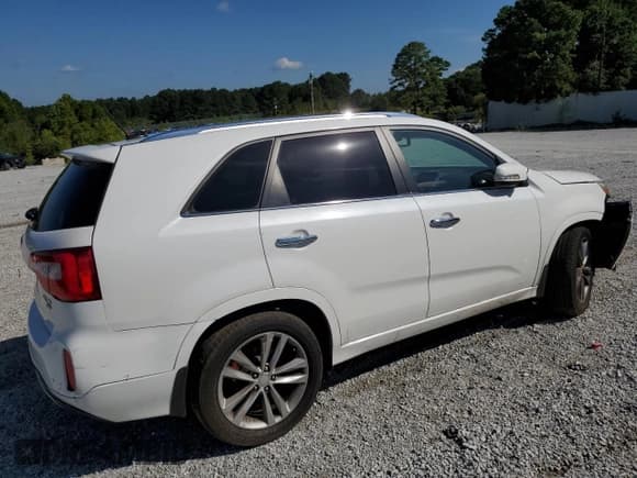 ✅ 2014 Kia Sorento SX Limited • VIN: 5XYKW4A79EG471690 • Lot: 66304645. Listed on Copart with 124,324 mi. Free auction sales archive from the USA and detailed vehicle history report at DreamBid. Image 3.