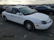 ✅ 1997 Ford Taurus GL • VIN: 1FALP52U3VA141657 • Лот: 80945913. Опубликован ранее на Copart с пробегом 111 343 миль. Бесплатный доступ к архиву аукционных продаж из США и подробный отчёт об истории автомобиля на DreamBid. Изображение 4.
