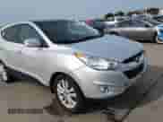 2013 Hyundai Tucson GLS with VIN KM8JU3AC7DU566198, listed as a Copart auction lot 71479605 with 196,474 mi miles and Salvage title. Bid and sale history available at DreamBid. Image 14.