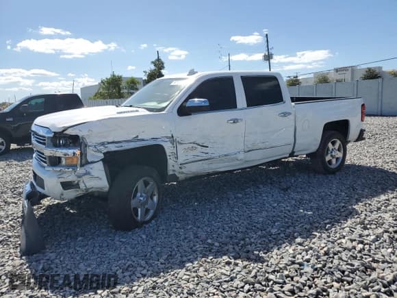 ✅ 2015 Chevrolet Silverado 2500HD High Country • VIN: 1GC1KXE85FF677959 • Lot: 90101215. Listed on Copart with 146,383 mi. Free auction sales archive from the USA and detailed vehicle history report at DreamBid. Image 1.