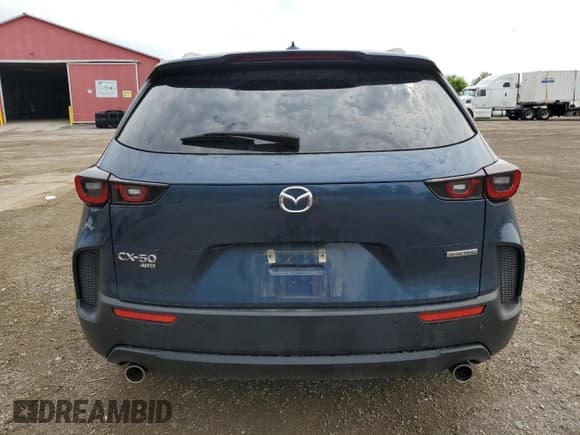 ✅ 2024 Mazda CX-50 S Premium • VIN: 7MMVABDM2RN157055 • Lot: 60693925. Wystawiony na Copart z przebiegiem 23 398 mil. Bezpłatny archiwum sprzedaży aukcyjnych z USA i szczegółowy raport historii pojazdu na DreamBid. Zdjęcie 6.