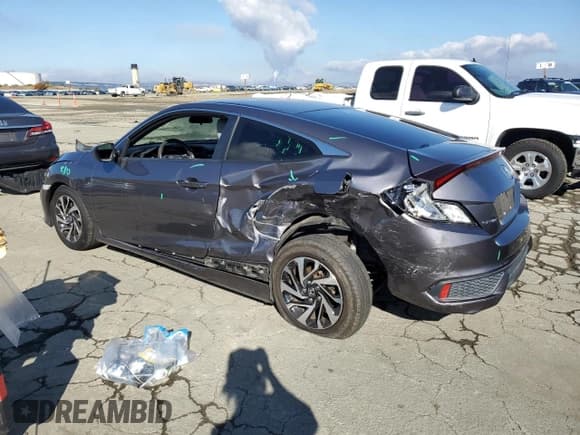 ✅ 2018 Honda Civic LX • VIN: 2HGFC4B51JH306320 • Lot: 86825845. Wystawiony na Copart z przebiegiem 83 345 mil. Bezpłatny archiwum sprzedaży aukcyjnych z USA i szczegółowy raport historii pojazdu na DreamBid. Zdjęcie 2.