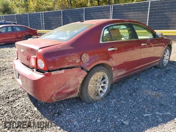 2010 Chevrolet Malibu LTZ z VIN 1G1ZE5EB2AF120406, wystawiony jako Copart lot #86856125 z przebiegiem 144 885 mil mil oraz Szkoda całkowita • Salvage title. Historia ofert i sprzedaży dostępna na DreamBid. Obrazek 3.
