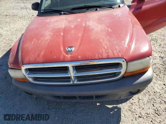 2004 Dodge Dakota z VIN 1D7GL12K34S504035, wystawiony jako Copart lot #46815725 z przebiegiem Nie podano mil oraz Szkoda całkowita • Salvage title. Historia ofert i sprzedaży dostępna na DreamBid. Obrazek 13.