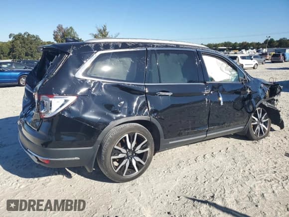 ✅ 2019 Honda Pilot Touring 8-Passenger • VIN: 5FNYF5H99KB013691 • Lot: 76752734. Listed on Copart with Not provided. Free auction sales archive from the USA and detailed vehicle history report at DreamBid. Image 3.