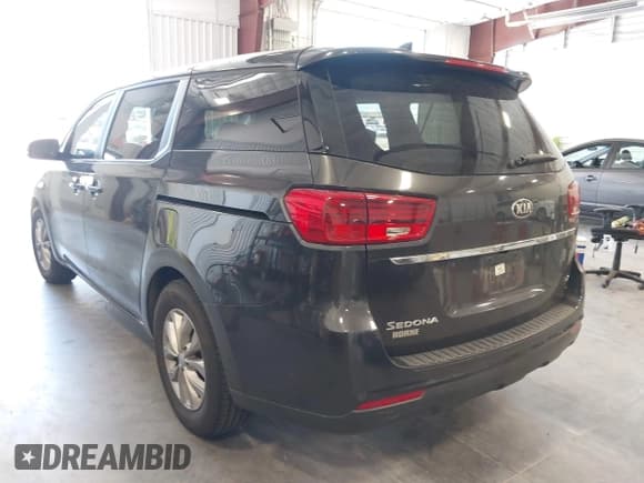✅ 2020 Kia Sedona EX • VIN: KNDMB5C15L6593188 • Lot: 42643755. Wystawiony na IAAI z przebiegiem 144 167 mil. Bezpłatny archiwum sprzedaży aukcyjnych z USA i szczegółowy raport historii pojazdu na DreamBid. Zdjęcie 3.