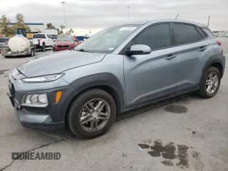 ✅ 2019 Hyundai Kona SE • VIN: KM8K1CAA8KU292017 • Лот: 75820663. Опубликован ранее на Copart с пробегом 98 088 миль. Бесплатный доступ к архиву аукционных продаж из США и подробный отчёт об истории автомобиля на DreamBid. Изображение 1.