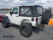 ✅ 2010 Jeep Wrangler Mountain • VIN: 1J4AA2D17AL145255 • Лот: 50129645. Опубликован ранее на Copart с пробегом 82 003 миль. Бесплатный доступ к архиву аукционных продаж из США и подробный отчёт об истории автомобиля на DreamBid. Изображение 2.