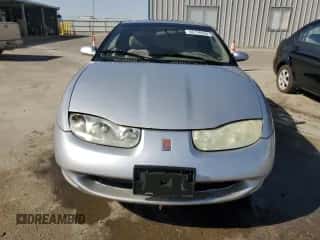 2002 Saturn SC z VIN 1G8ZY12712Z186012, wystawiony jako Copart lot #68756684 z przebiegiem 140 205 mil mil oraz Czysty tytuł • Clean title. Historia ofert i sprzedaży dostępna na DreamBid. Obrazek 5.
