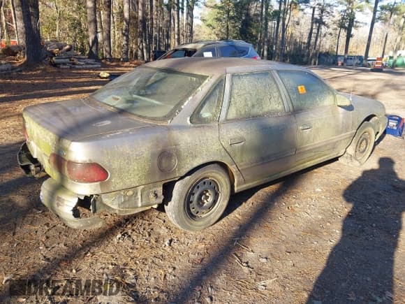 ✅ 1995 Ford Taurus GL • VIN: 1FALP52U1SA180937 • Lot: 43777224. Listed on IAAI with 138,027 mi. Free auction sales archive from the USA and detailed vehicle history report at DreamBid. Image 4.
