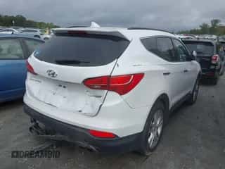 2014 Hyundai Santa Fe z VIN 5XYZU3LA6EG223937, wystawiony jako IAAI lot #43298591 z przebiegiem 130 000 mil mil oraz . Historia ofert i sprzedaży dostępna na DreamBid. Obrazek 4.
