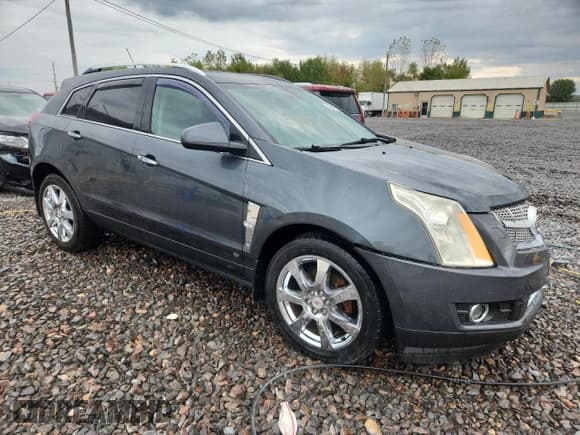 ✅ 2012 Cadillac SRX Performance Collection • VIN: 3GYFNBE30CS598950 • Lot: 81205505. Listed on Copart with 96,413 mi. Free auction sales archive from the USA and detailed vehicle history report at DreamBid. Image 4.