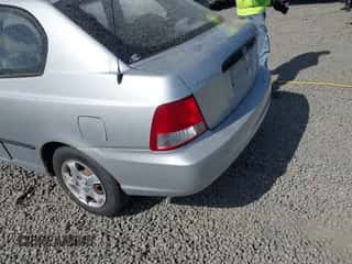 2002 Hyundai Accent z VIN KMHCF35G82U173856, wystawiony jako IAAI lot #42620048 z przebiegiem 128 986 mil mil oraz . Historia ofert i sprzedaży dostępna na DreamBid. Obrazek 6.