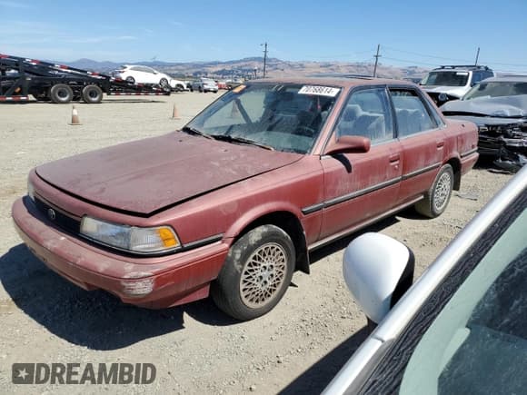 ✅ 1990 Toyota Camry LE ECT • VIN: JT2SV22E0L0351440 • Lot: 70768614. Listed on Copart with 176,239 mi. Free auction sales archive from the USA and detailed vehicle history report at DreamBid. Image 1.