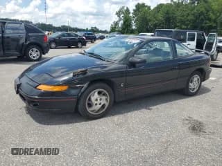 ✅ 1996 Saturn 2dr Coupe • VIN: 1G8ZH1279TZ371071 • Лот: 66602245. Опубликован ранее на Copart с пробегом 107 563 миль. Бесплатный доступ к архиву аукционных продаж из США и подробный отчёт об истории автомобиля на DreamBid. Изображение 1.