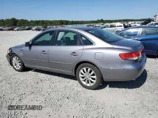 2007 Hyundai Azera SE z VIN KMHFC46F37A233990, wystawiony jako Copart lot #74978354 z przebiegiem 158 902 mil mil oraz Szkoda całkowita • Salvage title. Historia ofert i sprzedaży dostępna na DreamBid. Obrazek 2.