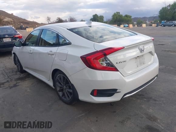 ✅ 2020 Honda Civic EX-L • VIN: 19XFC1F73LE209840 • Lot: 43728355. Listed on IAAI with 101,066 mi. Free auction sales archive from the USA and detailed vehicle history report at DreamBid. Image 3.