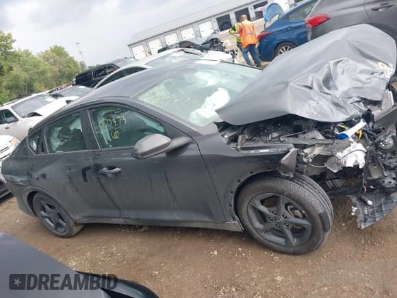 ✅ 2025 Kia K4 LXS • VIN: 3KPFT4DE5SE077973 • Лот: 43027830. Опубликован ранее на IAAI с пробегом 13 289 миль. Бесплатный доступ к архиву аукционных продаж из США и подробный отчёт об истории автомобиля на DreamBid. Изображение 12.