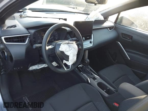 ✅ 2025 Toyota Corolla Cross Hybrid S • VIN: 7MUFBABGXSV086783 • Lot: 43234259. Listed on IAAI with 447 mi. Free auction sales archive from the USA and detailed vehicle history report at DreamBid. Image 18.