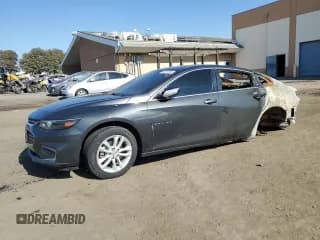 ✅ 2018 Chevrolet Malibu Hybrid • VIN: 1G1ZF5SU6JF253057 • Lot: 84294185. Listed on Copart with Not provided. Free auction sales archive from the USA and detailed vehicle history report at DreamBid. Image 1.