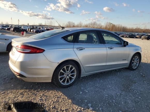 ✅ 2017 Ford Fusion Hybrid SE • VIN: 3FA6P0LU0HR121326 • Lot: 91582455. Listed on Copart with 166,386 mi. Free auction sales archive from the USA and detailed vehicle history report at DreamBid. Image 3.