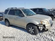 ✅ 2010 Mercury Mariner • VIN: 4M2CN9BG5AKJ11799 • Lot: 46441995. Listed on Copart with 125,871 mi. Free auction sales archive from the USA and detailed vehicle history report at DreamBid. Image 4.