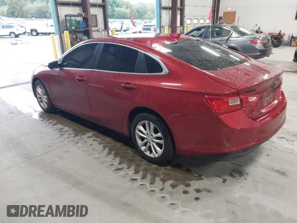 ✅ 2016 Chevrolet Malibu Hybrid • VIN: 1G1ZJ5SU0GF310084 • Lot: 43388707. Listed on IAAI with 141,678 mi. Free auction sales archive from the USA and detailed vehicle history report at DreamBid. Image 3.
