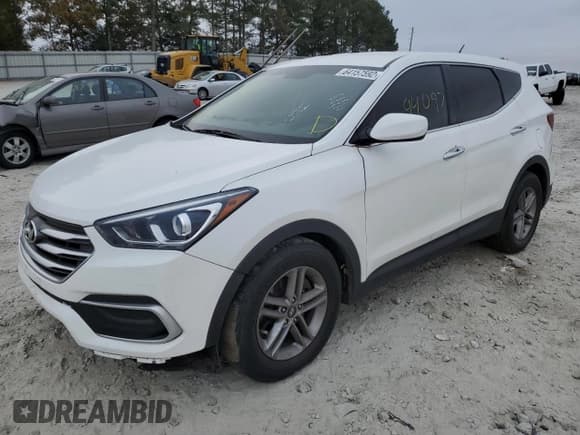 ✅ 2018 Hyundai Santa Fe 2.4L • VIN: 5NMZTDLB7JH098996 • Лот: 64157592. Опубликован ранее на Copart с пробегом 94 097 миль. Бесплатный доступ к архиву аукционных продаж из США и подробный отчёт об истории автомобиля на DreamBid. Изображение 2.