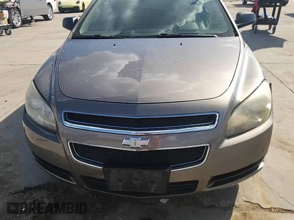 2012 Chevrolet Malibu 1LS с VIN 1G1ZB5E00CF159294, выставлен на аукционе Copart как лот 84747615 с пробегом 140 673 миль миль и Списание • Salvage title. История ставок и продаж доступна на DreamBid. Изображение 13.