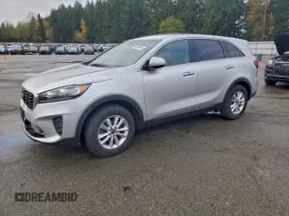 ✅ 2019 Kia Sorento L • VIN: 5XYPG4A3XKG573592 • Лот: 94418975. Опубликован ранее на Copart с пробегом 115 178 миль. Бесплатный доступ к архиву аукционных продаж из США и подробный отчёт об истории автомобиля на DreamBid. Изображение 1.