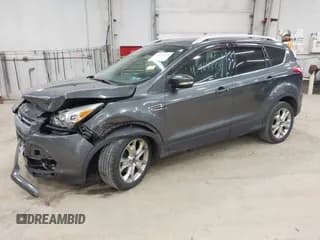 ✅ 2016 Ford Escape Titanium • VIN: 1FMCU9JX8GUA82222 • Lot: 43464224. Listed on IAAI with 110,339 mi. Free auction sales archive from the USA and detailed vehicle history report at DreamBid. Image 2.