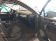 ✅ 2013 Volkswagen Touareg Sport • VIN: WVGEF9BPXDD008121 • Lot: 43065668. Listed on IAAI with 86,922 mi. Free auction sales archive from the USA and detailed vehicle history report at DreamBid. Image 5.