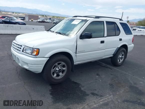 ✅ 2001 Isuzu Rodeo S • VIN: 4S2CK58W614329085 • Лот: 42303013. Опубликован ранее на IAAI с пробегом 171 933 миль. Бесплатный доступ к архиву аукционных продаж из США и подробный отчёт об истории автомобиля на DreamBid. Изображение 2.